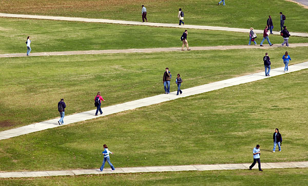 Students walk across Drill Field to class