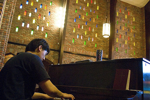 Playing piano in the Chapel