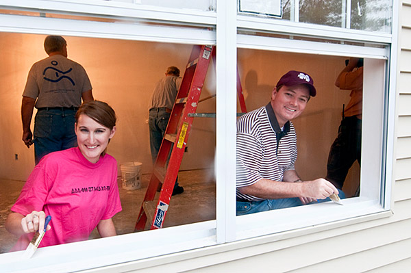 Keenum paints at the Maroon Edition for Habitat House