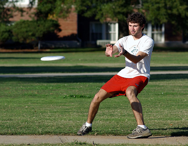 Throwing frisbee on Drill Field