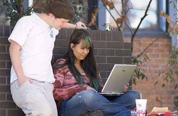 Students sitting outside union