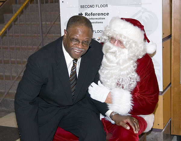 Coach Croom visits with Santa