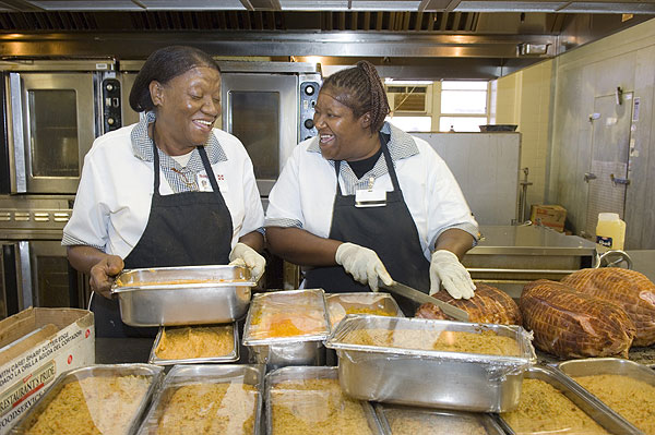 Cafeteria cooks preparing Thanksgiving meal