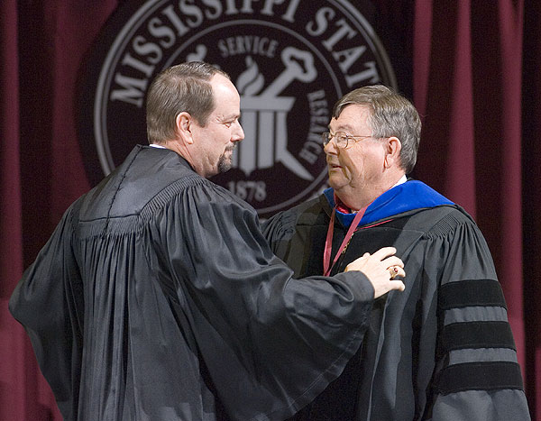 Dr. Lee congratulations son, John Lee at graduation