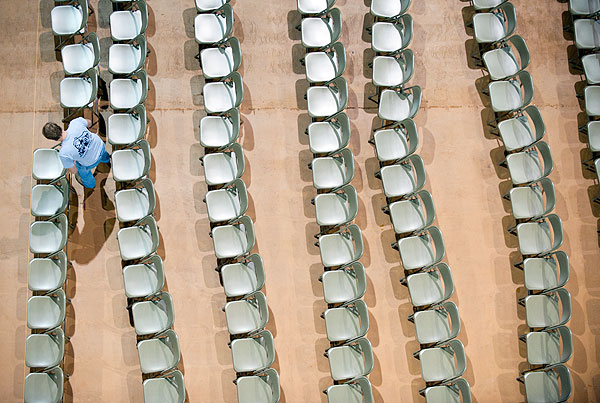 Setting up chairs for graduation