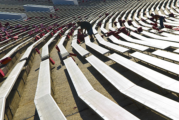 Seat cushions at the stadium are taken down