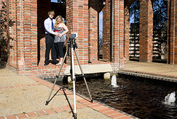 Couple taking Christmas card photo at Chapel