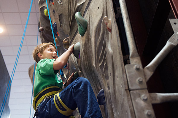 Child at climbing wall