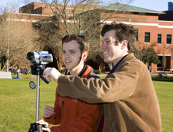 Students enjoy weather while working on project