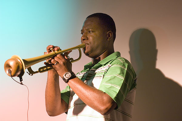 Brice Miller plays trumpet at Dawg House