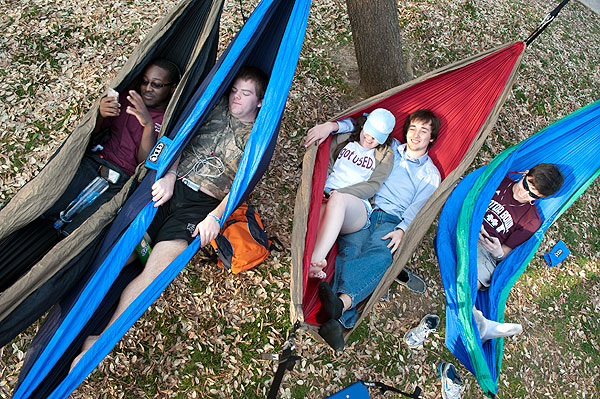 Friends hanging around in hammocks