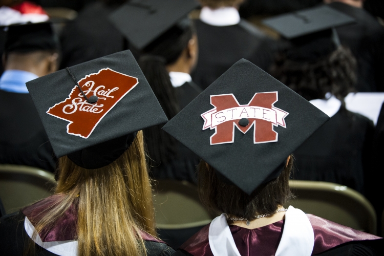 Graduation caps at graduation ceremony | Mississippi State University News  Archive