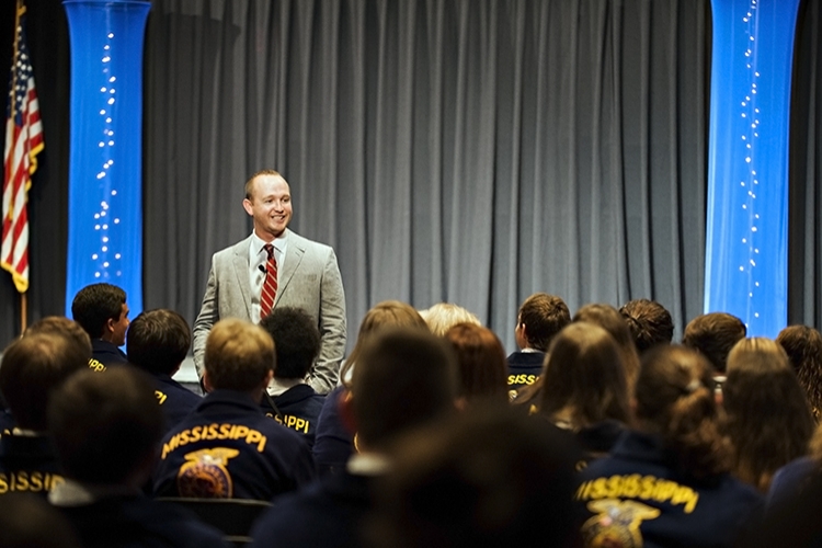 Barrett Keene, a motivational speaker for FFA, is giving the students an encouraging talk