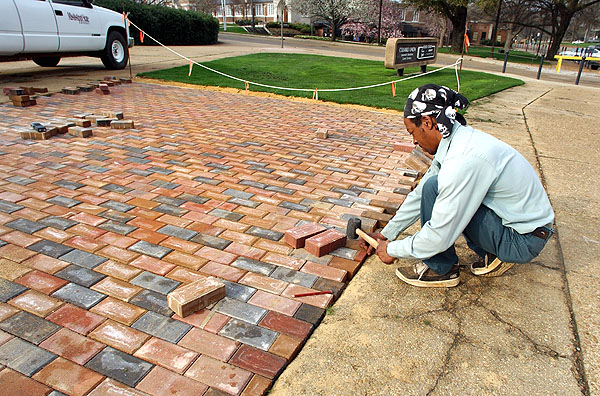 Laying bricks at the Bull Ring