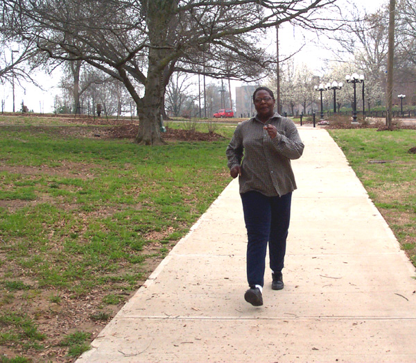 Walker near Freeman Hall during Spring Break