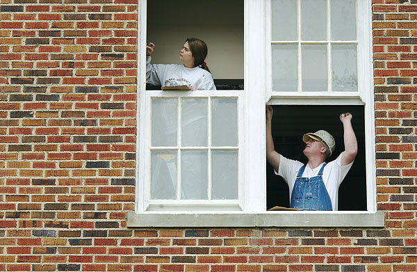 Bowen Hall construction workers in window