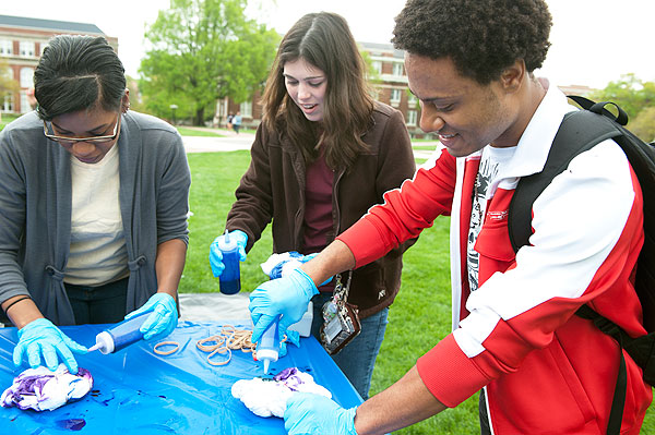 Students making tie dye shirts