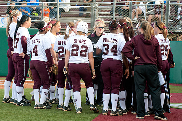 Coach Stuedeman talking to the softball team