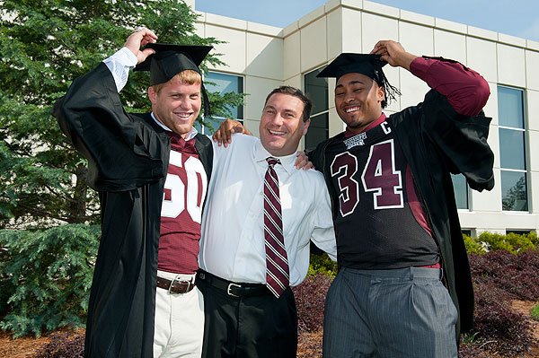 Mullen clowning around with football grads