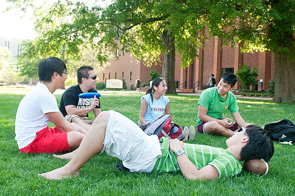 Students lounging on the Drill Field