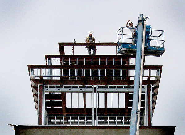 Construction workers on top of union tower