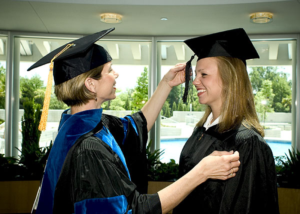 Sandy &amp;amp;amp;amp; Andrea Slocum in graduation gowns