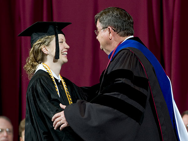 Brooke Shannon is greeted by Dr. Lee at graduation