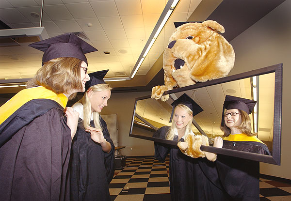 Getting ready for a graduation photo