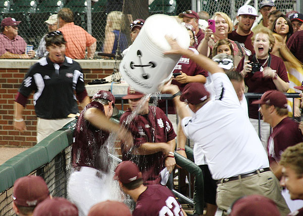 John Cohen Gets Doused With Water