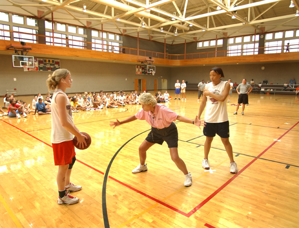 Coach Sharon Fanning demonstrates defensive techniques