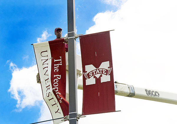 Hanging the Peoples University Banner