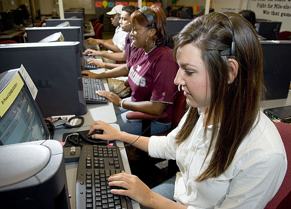 Students on the phone at the Calling Center