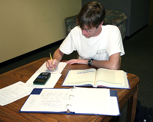 Student studying at library