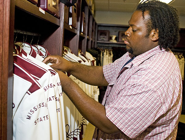 Organizing uniforms at new band hall