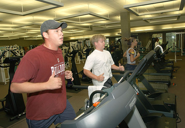 Students workout on treadmill at Sanderson Center