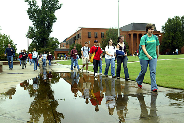 Students dodge puddles after rain