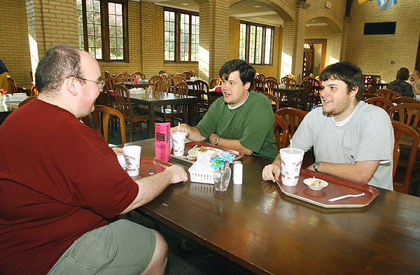 Students enjoy breakfast in the cafeteria