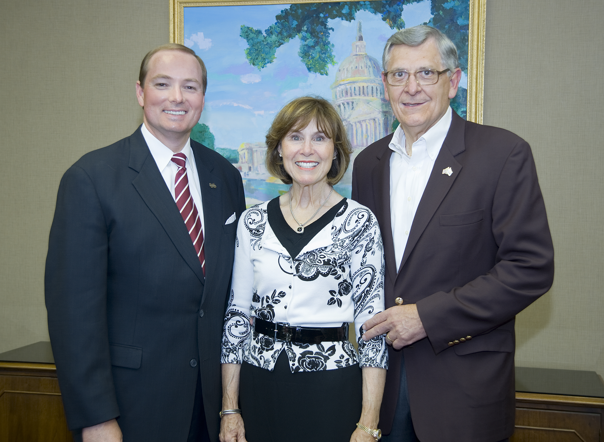 Mississippi State benefactors Jim (r) and Julia Rouse with university President Mark Keenum.