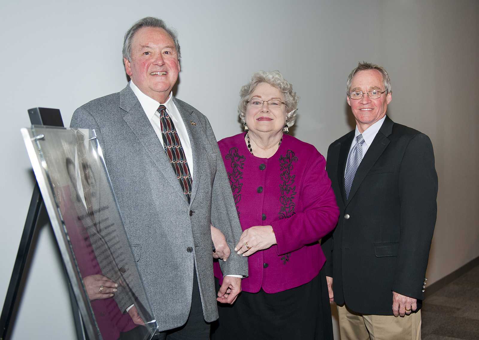 The newly renovated Giles Hall auditorium was named Friday [Jan. 28] in honor of Robert and Freda Harrison, left and center. Shown with the Harrisons is Jim West, dean of MSU's College of Architecture, Art, and Design.