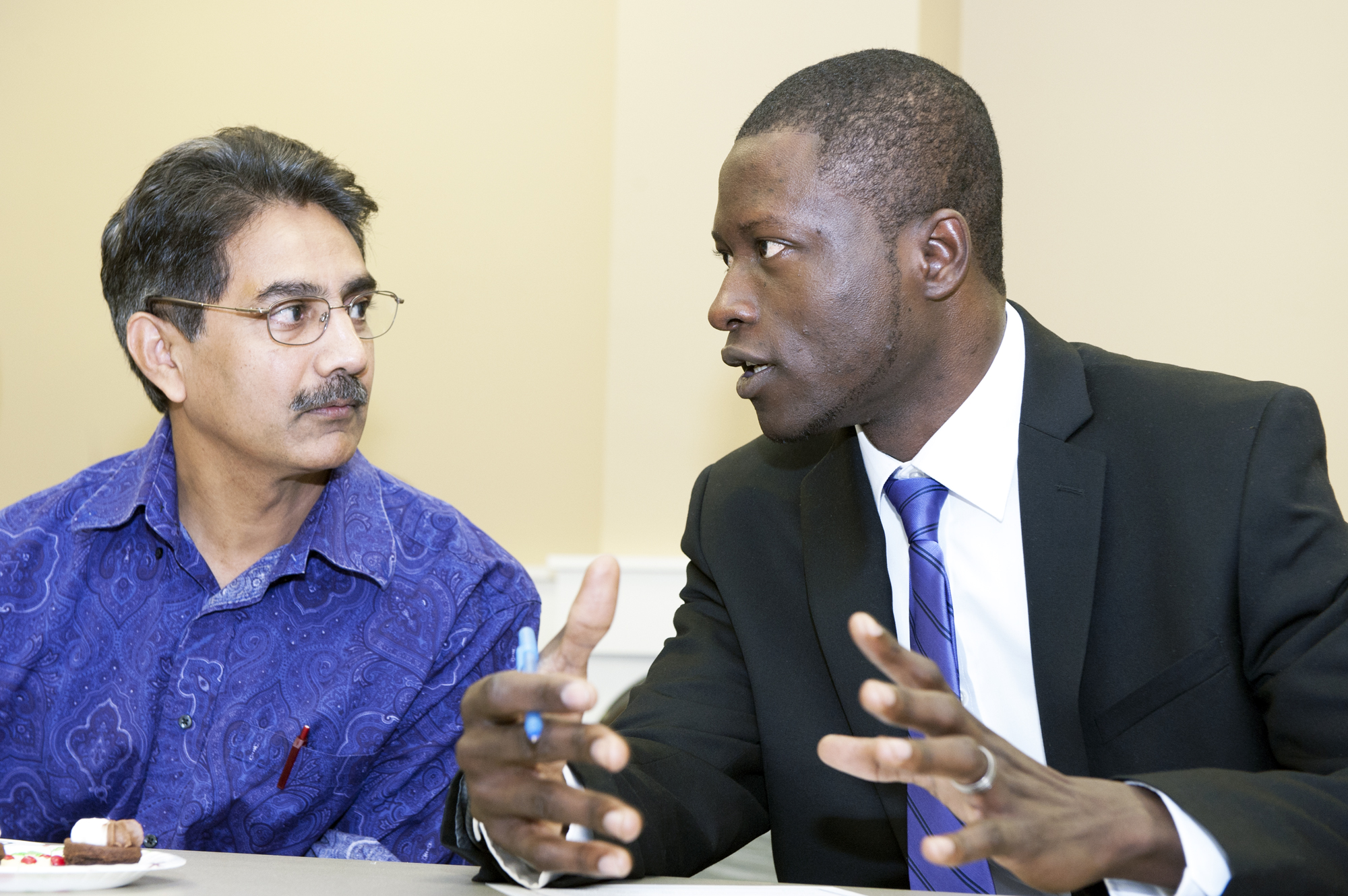 MSU graduate student and award winner Ademola Olandunjoye (r) is congratulated by faculty adviser Rama Nannapaneni during a recent award reception.