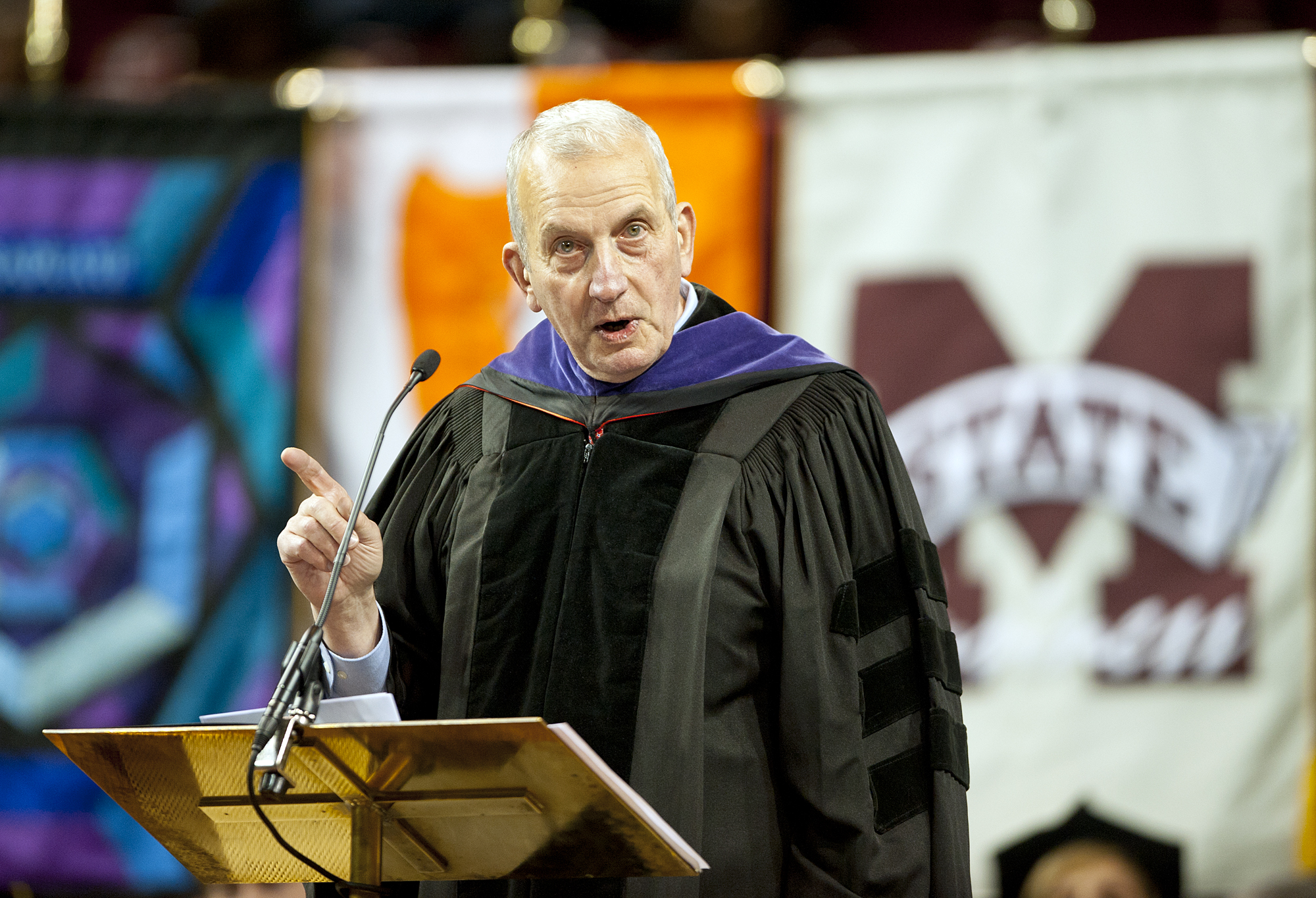 Frank J. Williams, former chief justice of the Rhode Island Supreme Court, addresses MSU graduates during commencement ceremonies at Humphrey Coliseum.