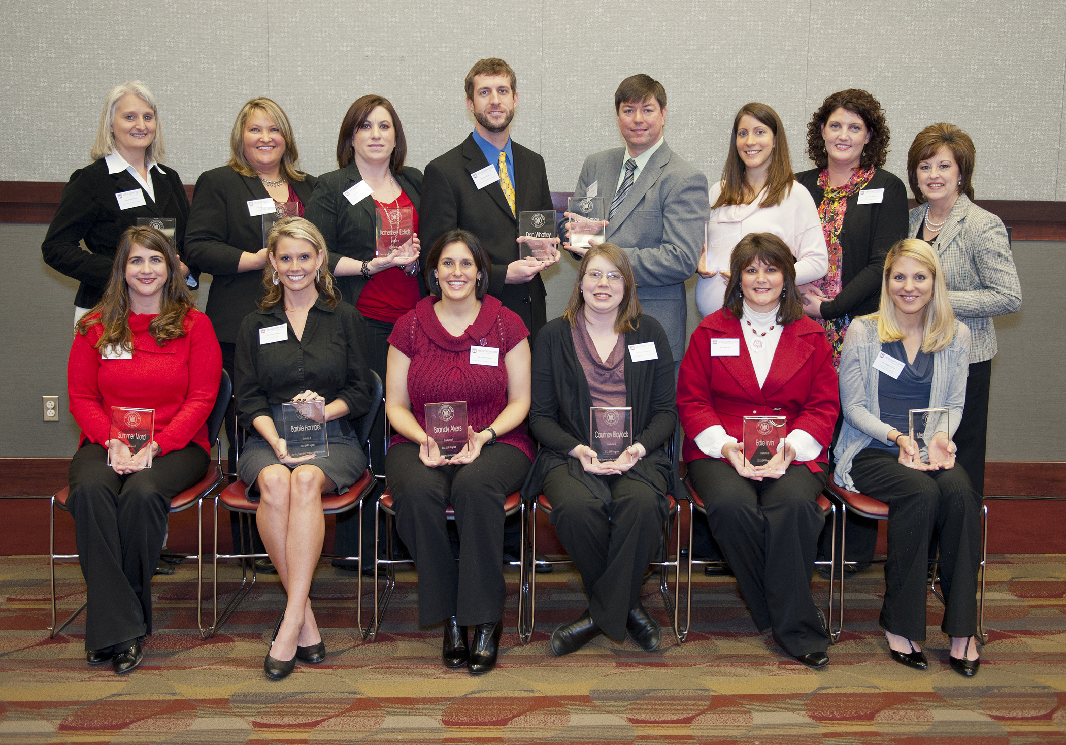 2011 Learning Experience for Aspiring Professionals graduates are Summer Mord (front, l-r) Barbie Hampel, Brandy Akers, Courtney Blaylock, Edie Irvin, Meggan Franks; and Angie Waller (back, l-r), Karin Lee, Katie Echols, Dan Whatley, Darrell Easley, Amanda Seymour, Terri Johnson and Diane Alexander.