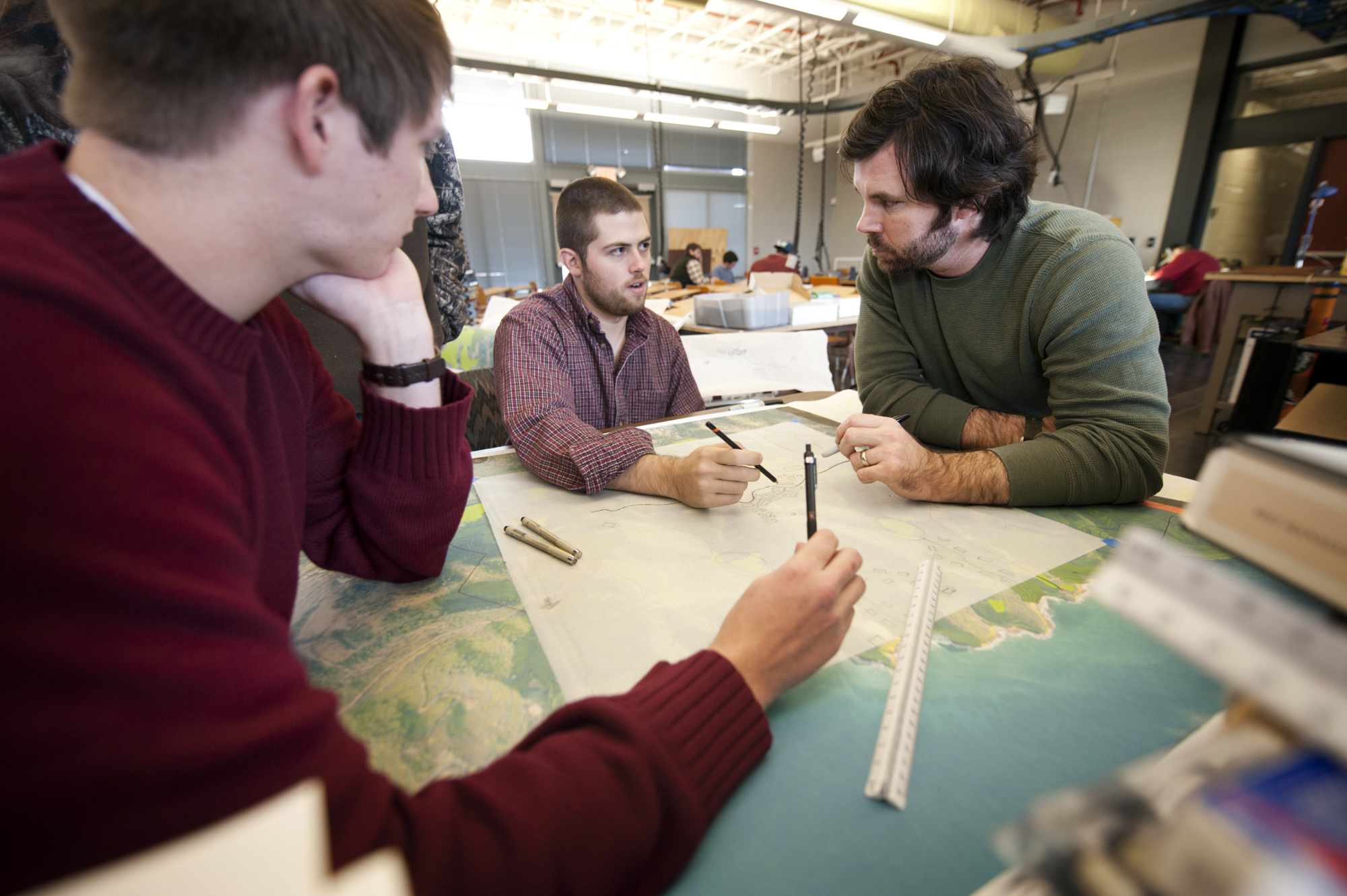 MSU landscape architecture majors (l-r) Casey Mayne of Florence, Owen Harris of Collierville, Tenn., and Cory Lucius of Senatobia create details for their design plan.