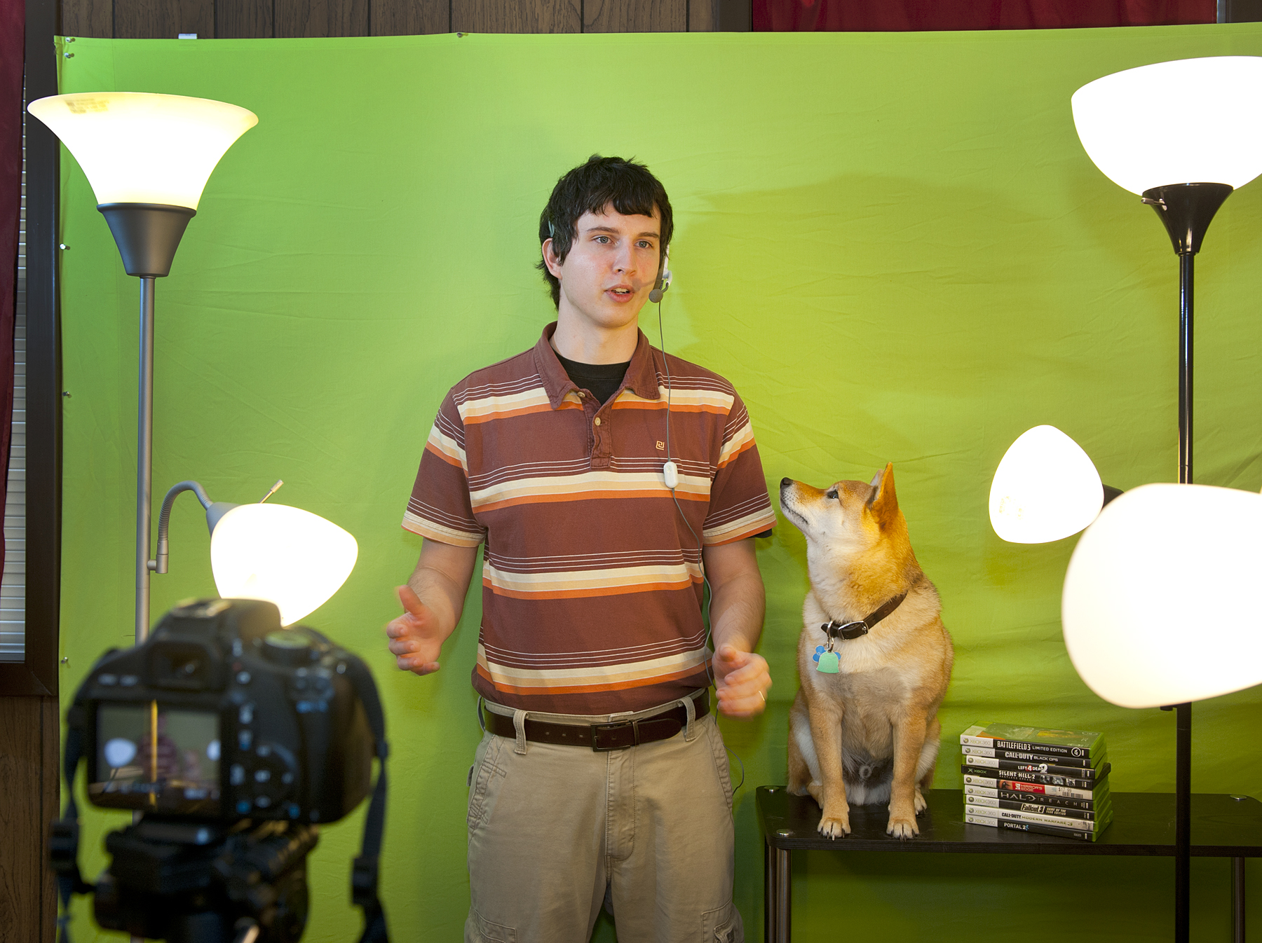 MSU graduate student Brad Overbey rehearses an upcoming YouTube video with co-star and pet Ozy. 