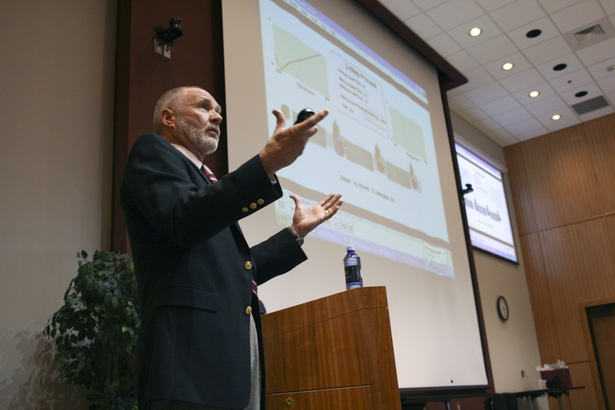 Allen Greenwood, a professor of industrial and systems engineering at MSU's Bagley College of Engineering, describes how advanced modeling and simulation at the university's Center for Advanced Vehicular Systems Extension can assist manufacturing facilities with operational performance. Greenwood was one of the presenters at the university's Franklin Furniture Institute speaking at a summit Wednesday on furniture manufacturing. 