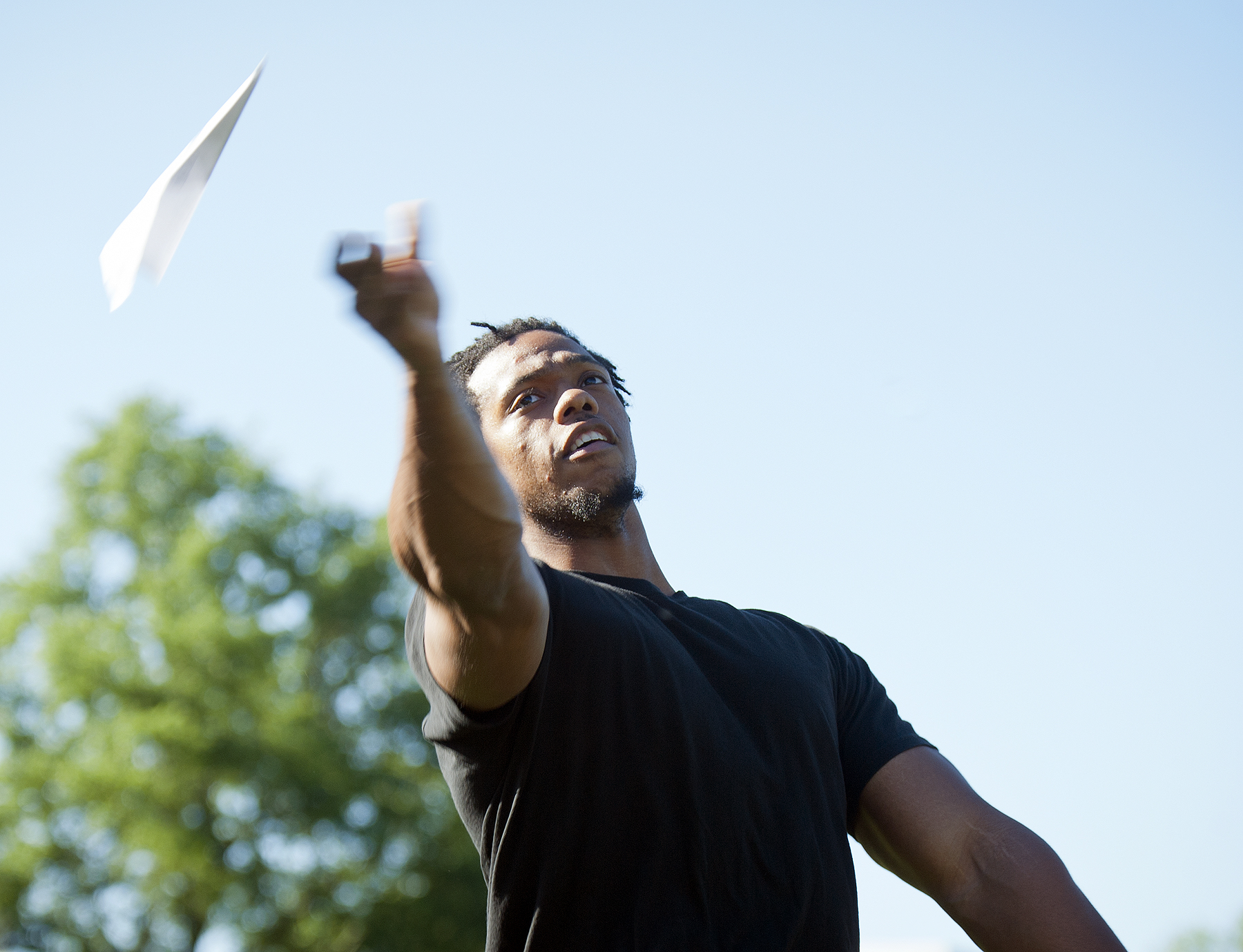 Junior kinesiology major Byron Robinson, of Mound Bayou, launches his paper airplane during the event. 