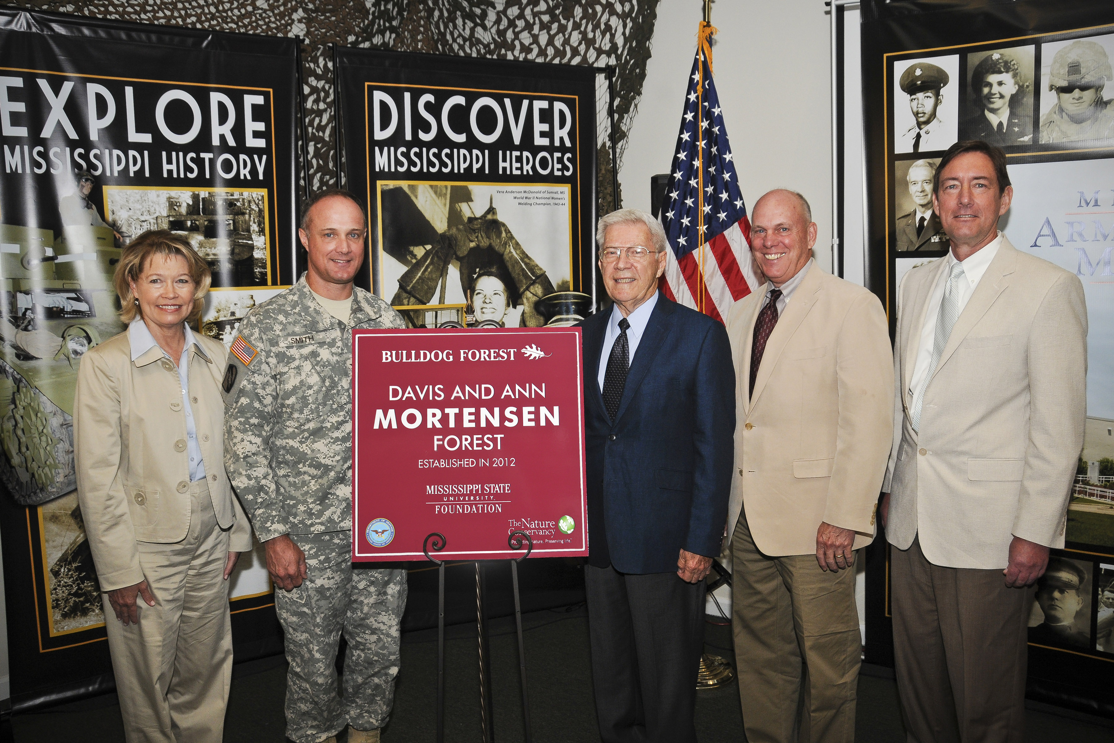 Pictured during the May 29 dedication ceremony, from left, Susan Hollandsworth of The Nature Conservancy; Col. William B. Smith Jr., Camp Shelby installation commander; Davis Mortensen; George Hopper, dean of MSU's College of Forest Resources; and Gregory Bohach, vice president of MSU's Division of Agriculture, Forestry and Veterinary Medicine.