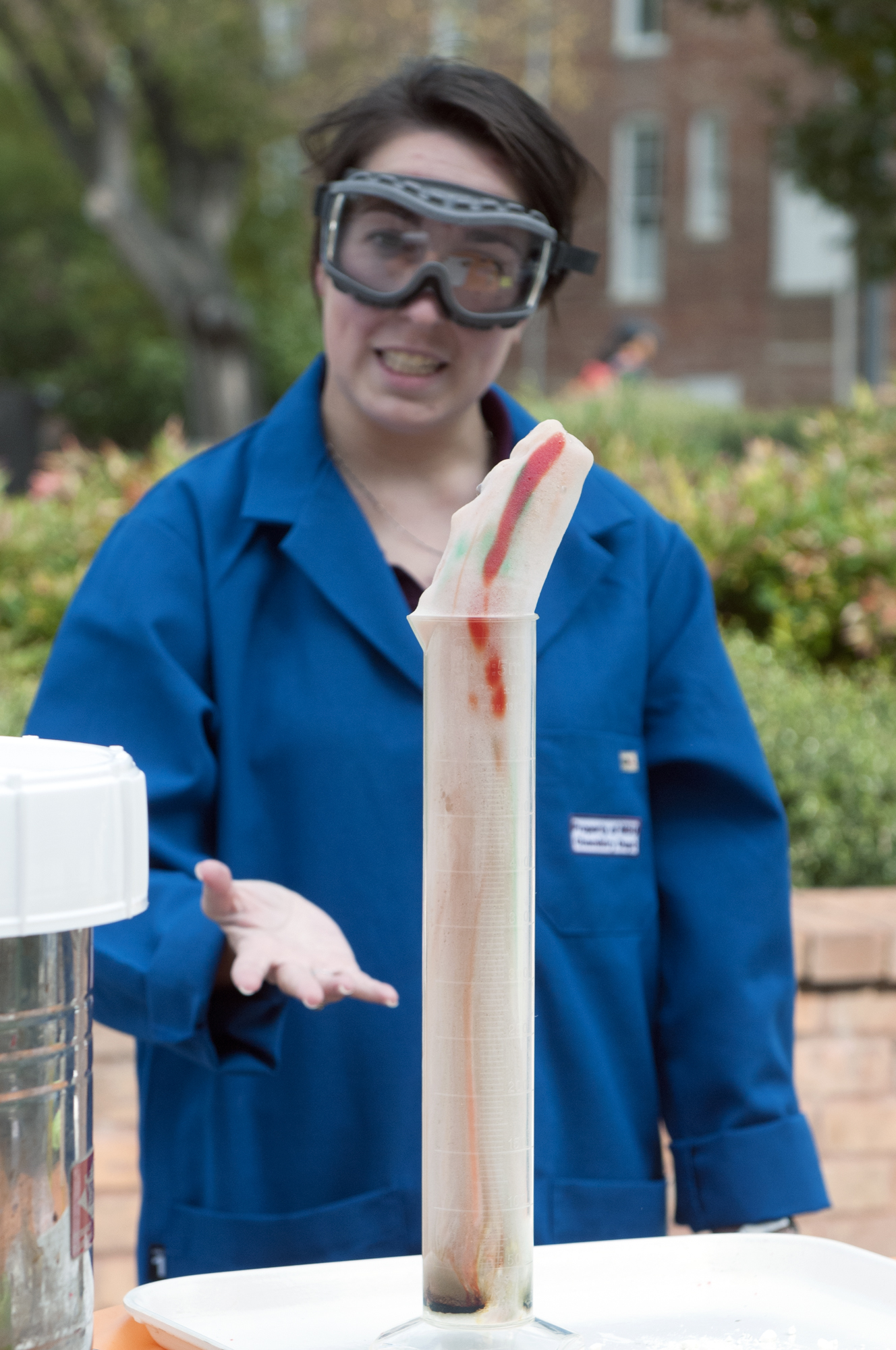 Mississippi State University's Student Affiliates of the American Chemical Society member Taylor Clark, of Kerrville, Texas, explains how she created elephant toothpaste from active yeast, hydrogen peroxide and food coloring at a recent on-campus chemical demonstration.