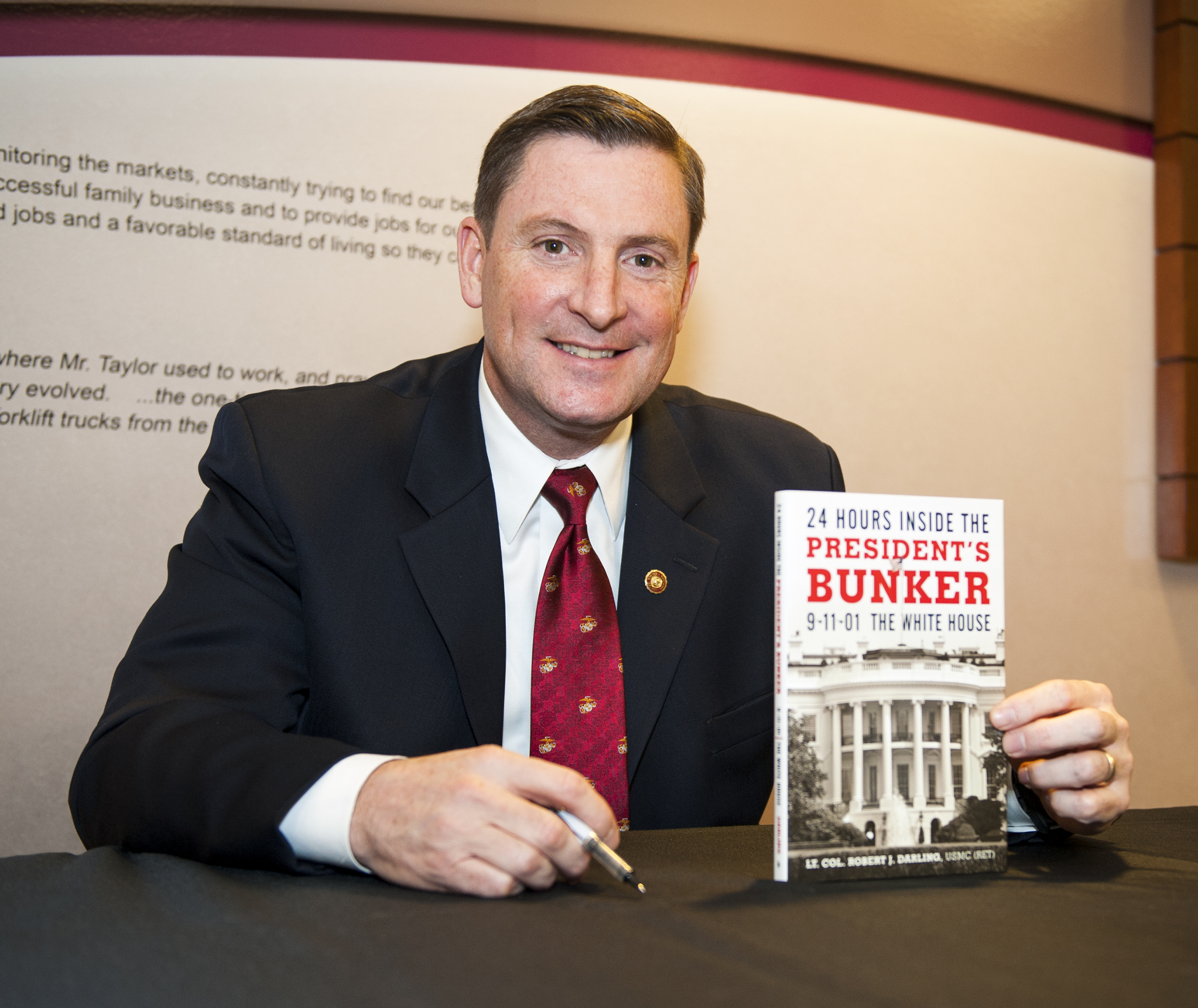 Retired Lt. Col. Robert J. Darling signed copies of his book, "24 Hours Inside the President's Bunker: 9-11-01," both before and after his Thursday night presentation at MSU, where he remembered the events surrounding Sept. 11, 2001, and thanked all service members, past and present, for their sacrifice.