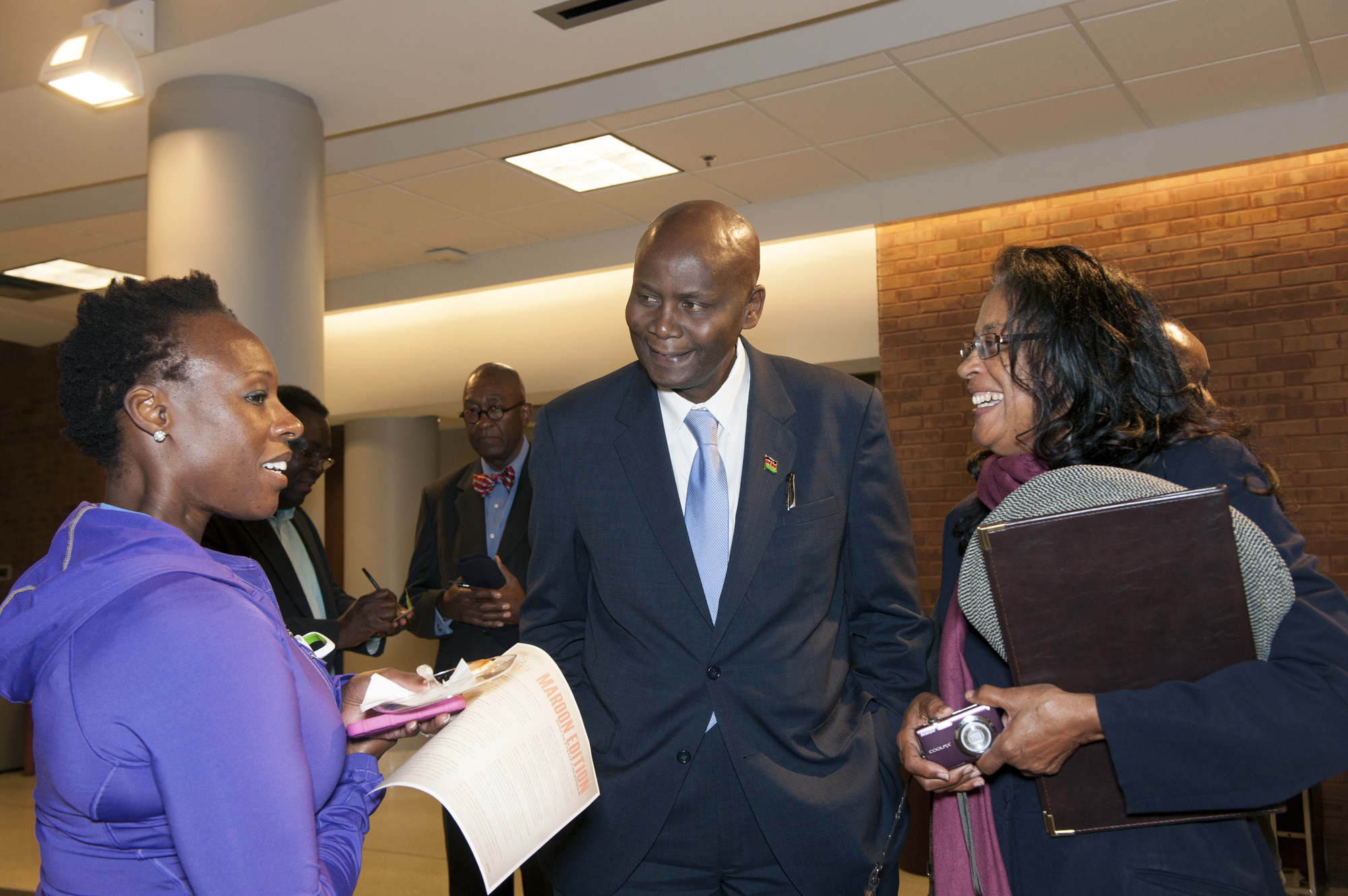 Elkanah Odembo, Kenya's ambassador to the United States, visits with participants during a Maroon Edition event during the fall semester.